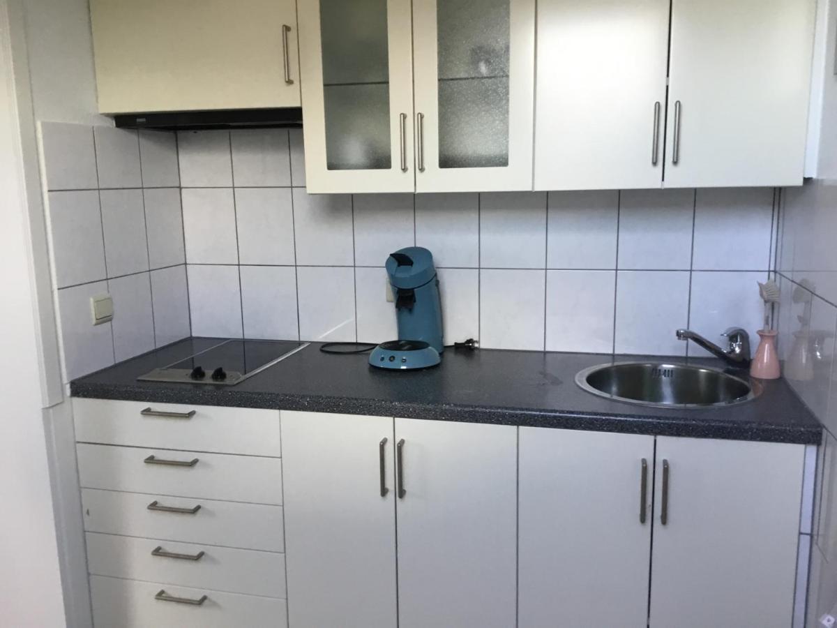 De Achtertuin Apartamento Maasmechelen Exterior foto